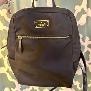 Small black backpack by Kate Spade.